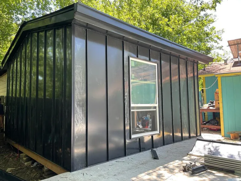 Black standing seam metal wall panels for Metal Roof Installation in Ormond-by-the-Sea